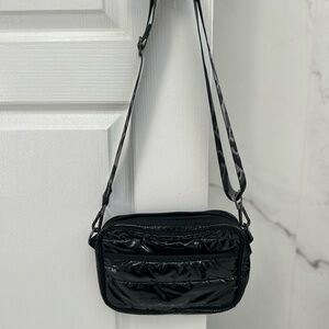 HAUTE SHORE Glossy Black Crossbody Bag